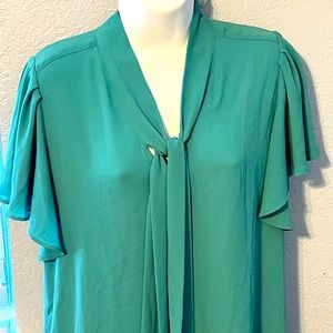Ann Taylor Loft flutter sleeve blouse in very good used condition.